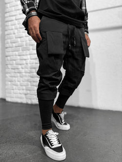 Hose aus Funktionsstoff von Black Island mit elastischem, verstellbaren Bund. Aufgesetzte Vordertaschen. Elastischer, eng verlaufender Beinabschluss.    Unser Model trägt Größe L.   Körperlänge: 180 cm (5.91 ft)  Gewicht: 77 kg (169,76 lbs)   Farbe: Schwarz  Material: 100% Polyeste